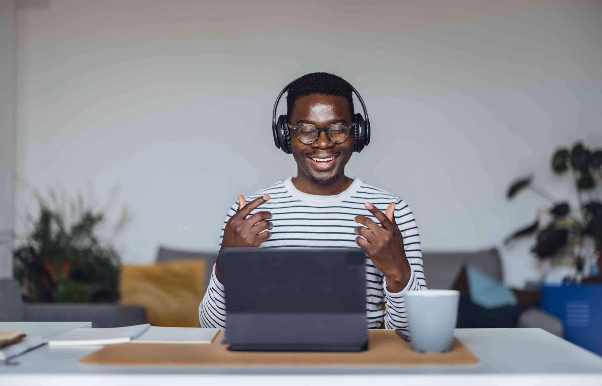 Therapist participating in online therapy session at desk