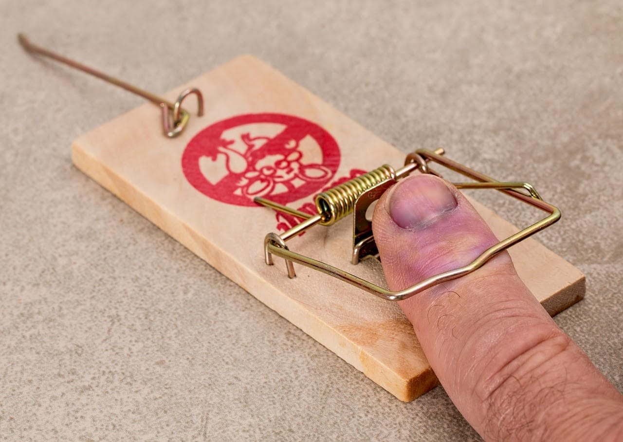 Finger pinched in a wooden mouse trap