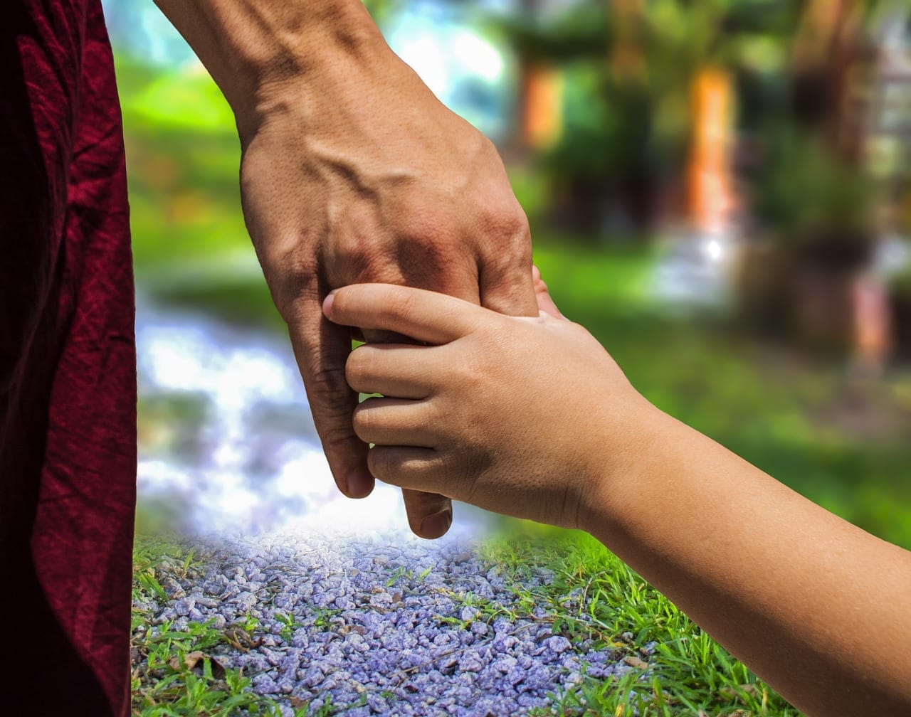 Supportive hands representing guidance and connection in therapy services