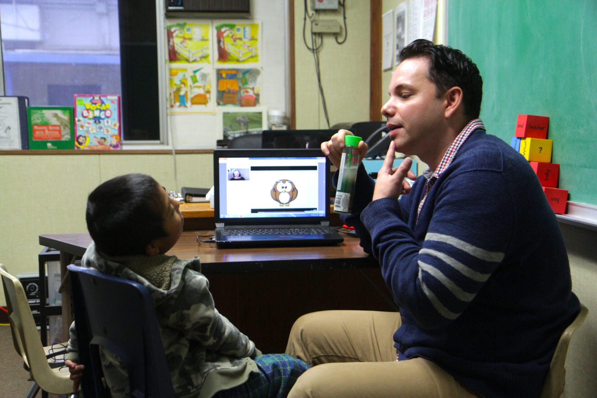 Online therapy session between a therapist and a young student