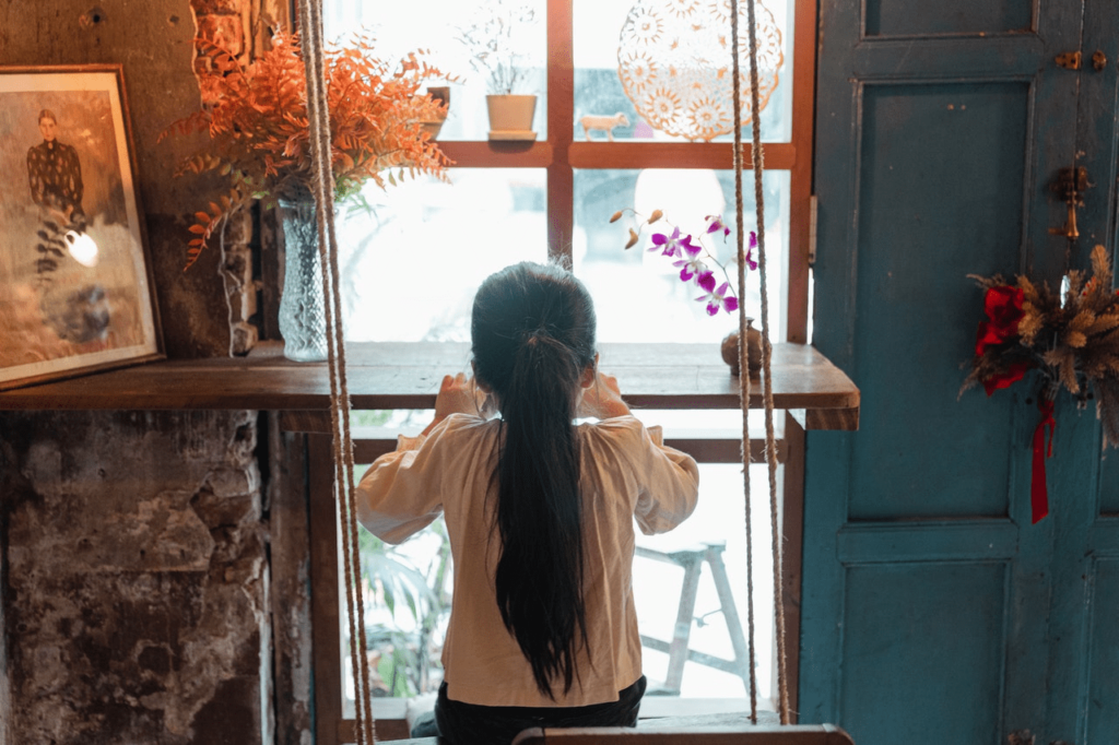 Child looking out window
