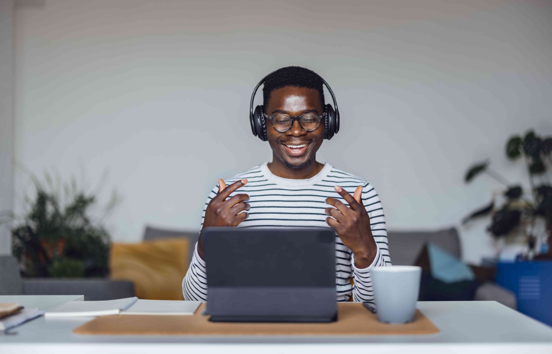 Therapist participating in online therapy session at desk