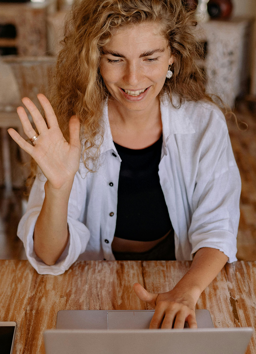 Smiling teletherapist engaged with online learning